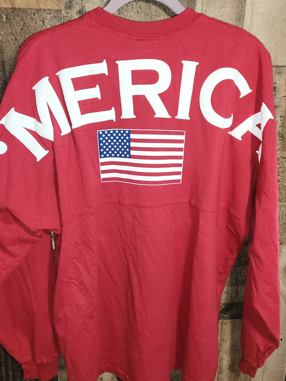 Spirit Red Long-Sleeve Tee with White Bow Graphic